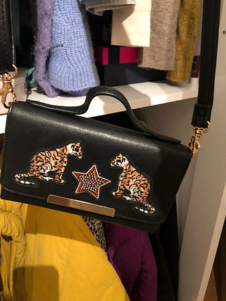 Aldo hem çapraz çanta hem clutch hem cüzdan olarak kullanılabili